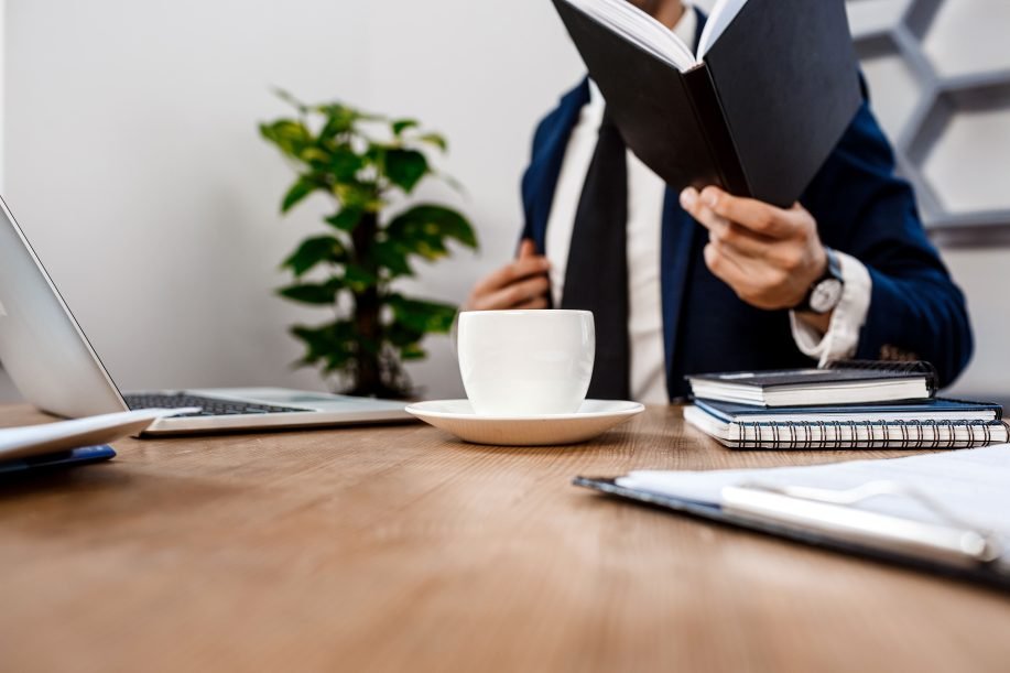 A criminal lawyer reviewing digital evidence in preparation for a criminal trial